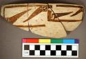 Restorable sherd--part of pottery bowl. Jeddito black-on-yellow