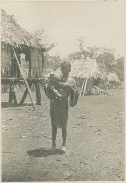 Mangyan woman with her child