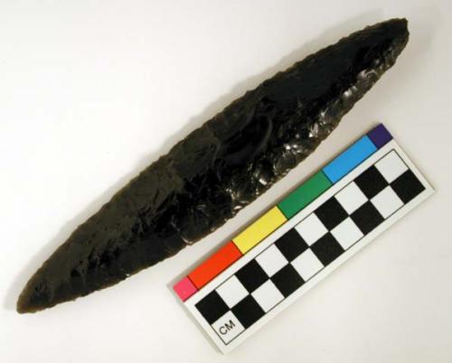 Chipped implement; chipped from black obsidian