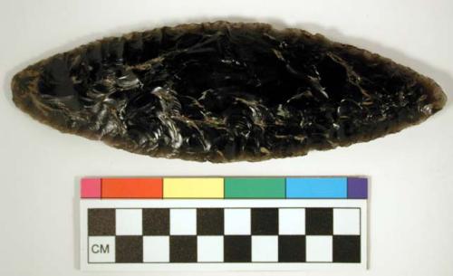 Chipped implement; chipped from black obsidian