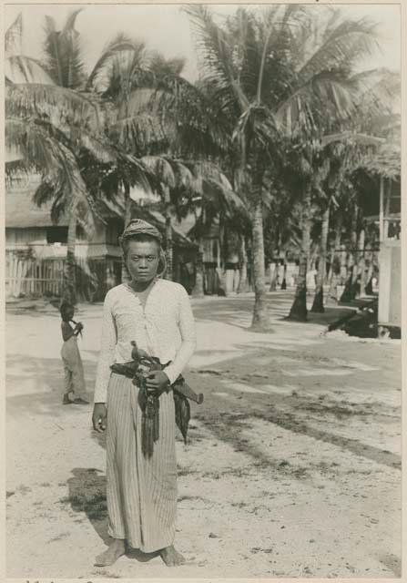 "Moro" man wearing traditional clothing