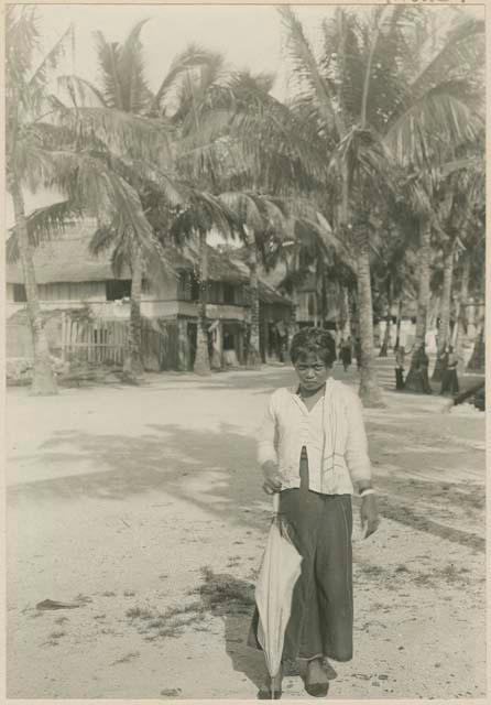 Woman standing on street