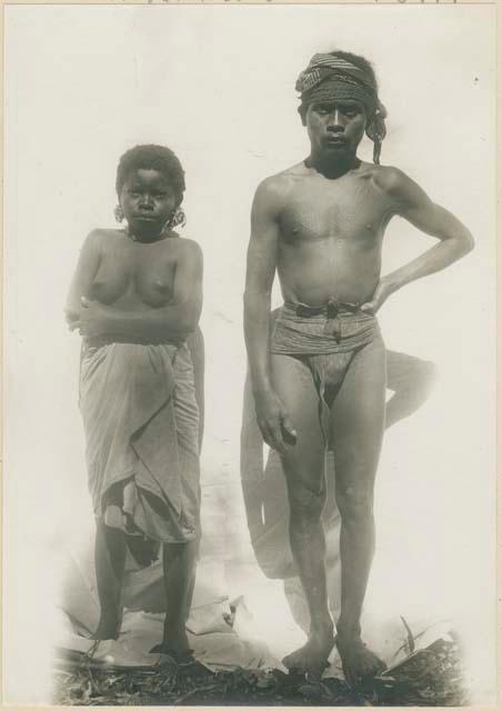 Man and woman posing together