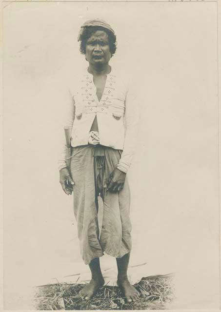 Subano man in Moro dress with curly hair