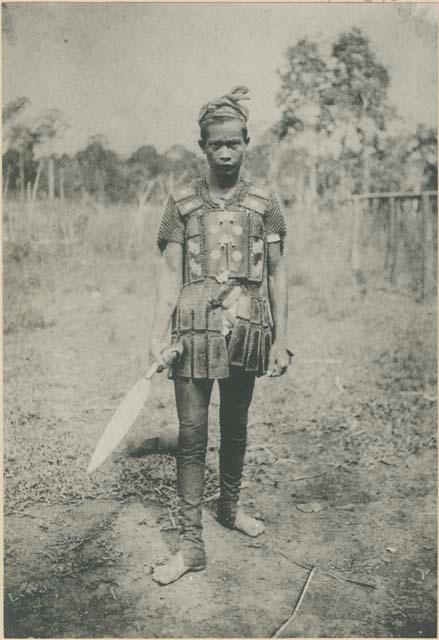 "Moro" wearing mail armor and holding barong