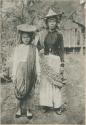 Two "Moro" women wearing hats