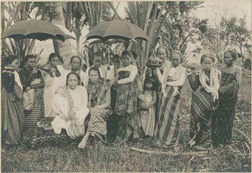 Wife of Sultan of Maguidanao with her assistants