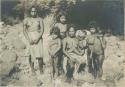 Mangyan woman sitting with her children