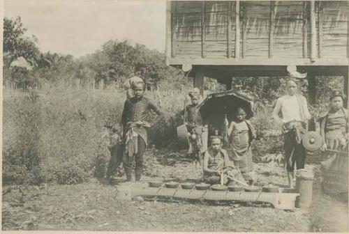 "Moro" men and women with musical instruments