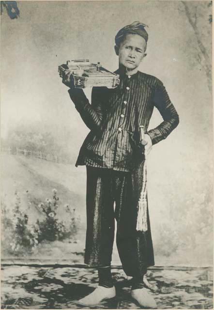 Man with betel box