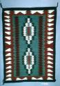 Klagetoh rug, two central diamond forms of concentric triangles