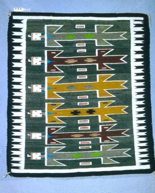 Pictorial rug with six stylized yei figures