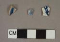 Ceramic, stoneware, grey-bodied Westerwald-type, body sherd (1); Ceramic, earthenware, pearlware, blue shell-edged rim sherd (1); Ceramic, earthenware, pearlware, hand-painted, Chinoiserie pattern, body sherd (1)