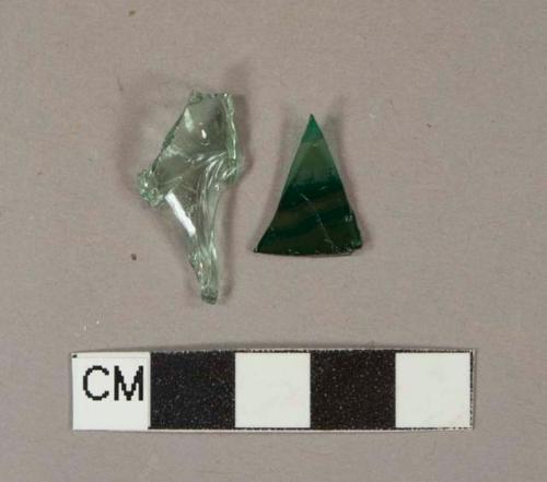 Glass, curved, green, fragments