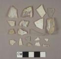 Colorless glass vessel body fragments,  1 vessel base fragment, 3 flat glass fragments