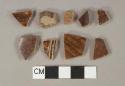 Brown slip glazed earthenware vessel body fragments, buff paste, likely rockingham ware