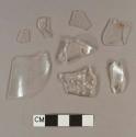 Colorless bottle glass fragments, two fragments crossmend