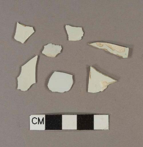 Undecorated pearlware body sherds, two with possible molded decoration