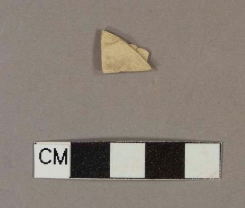 Unidentified refined earthenware body sherd, missing finished surface on both sides