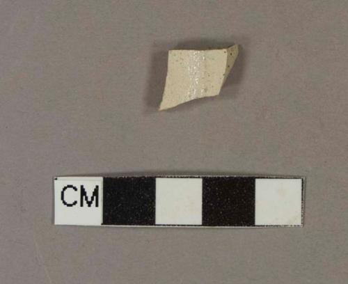 Undecorated white salt glaze stoneware body sherd, possibly base sherd