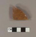 Brown glazed, gray bodied stoneware body sherd