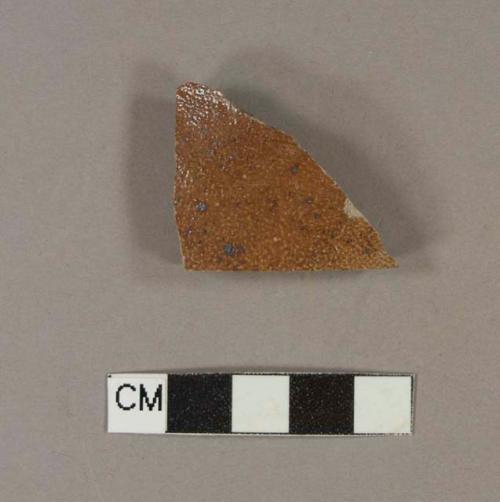 Brown glazed, gray bodied stoneware body sherd