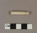 Unsmoked, undecorated pipe mouthpiece fragment, signficant tooth wear near mouthpiece end, 4/64" bore diameter