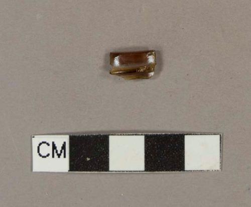 Glass, amber bottle glass rim fragment with external threading