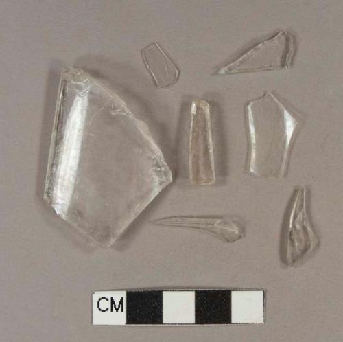 Colorless bottle glass fragments; two have mold seams