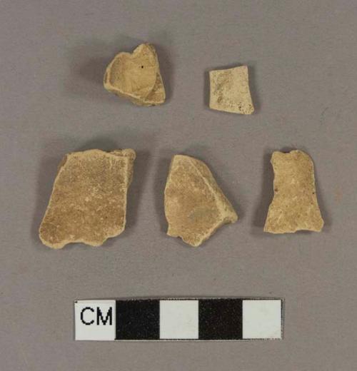 Tin glaze earthenware body sherds, missing all glaze