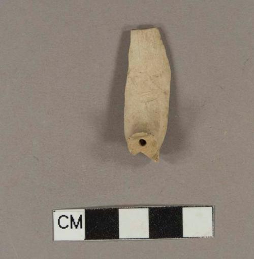 Unsmoked pipe bowl, heel, and stem fragment; bowl is incised with "WM" cartouche; heel has "[crown] M" stamped on one side