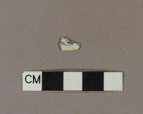 Green transfer printed whiteware body sherd