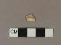 Unidentified earthenware body sherd with only a small chip of glaze remaining