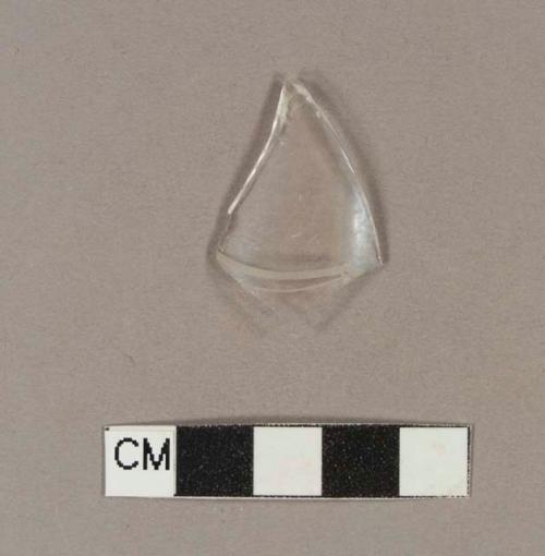 Colorless bottle glass fragment with etched design