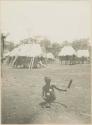 Woman spinning cotton