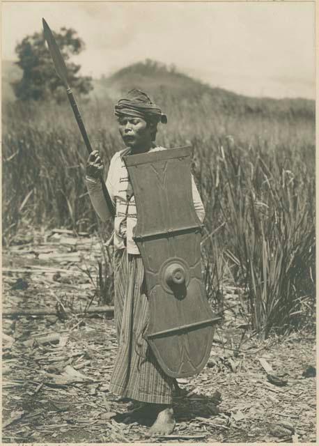 Chief with shield and lance