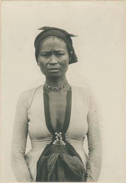 Same woman, wearing Moro-style upper garment