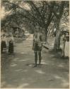 Man in beaded garment