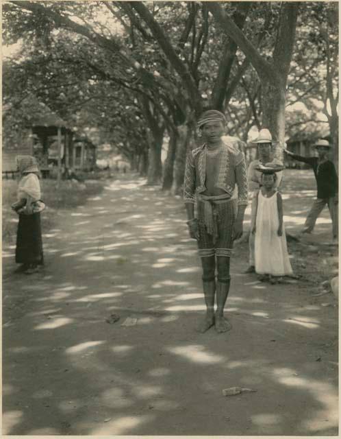 Man in beaded garment