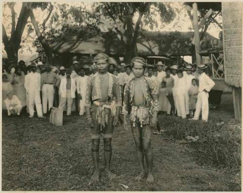 Two men in beaded garments