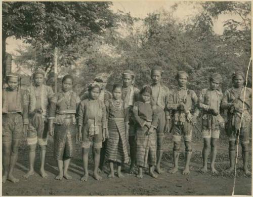 Young men and women, beaded garments