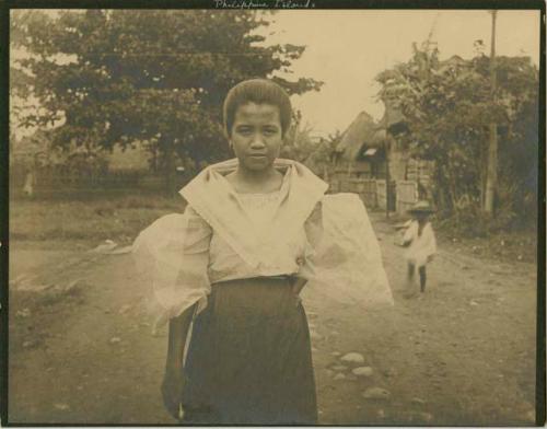 Woman; western dress, large white sleeves