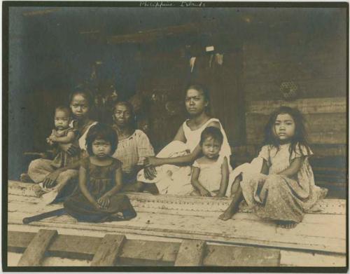 Women and girls, seated