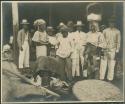 Group, woven basket in foreground