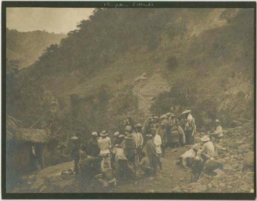 Group, men in hats, landscape