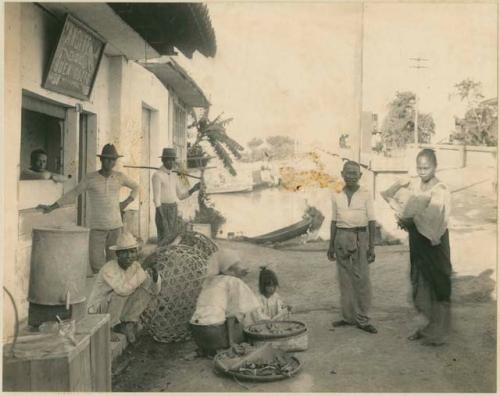 People outside of panciteria de buen gusto