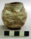 Polychrome pottery miniature jar - brown, red, yellow
