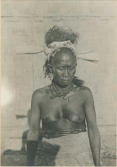 Batak woman, showing head dress