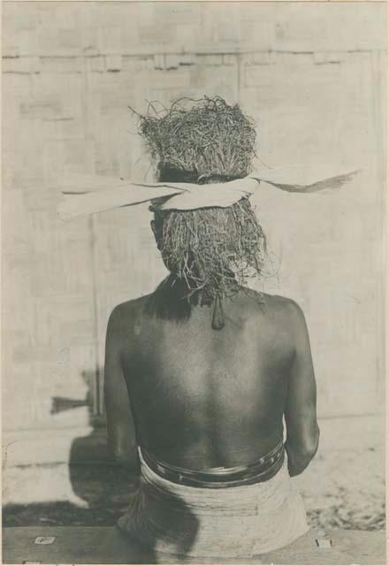 Batak woman, showing head dress