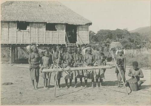 Group of Batak people with instrument